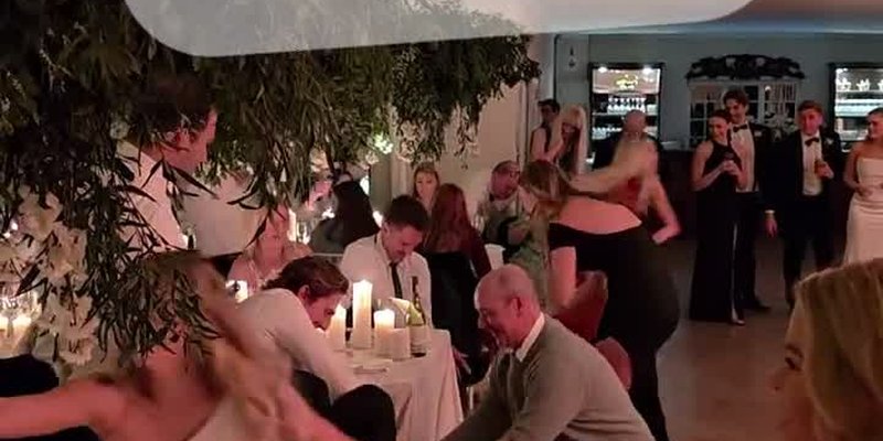 Wedding guests playing scavenger hunt game