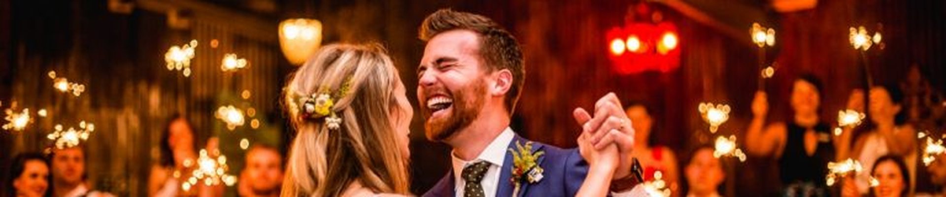 Wedding reception dance floor with guests dancing