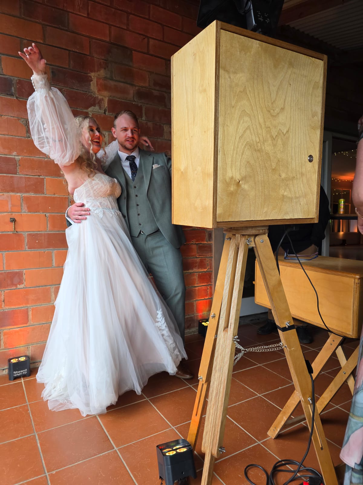 Professional photo booth at Providence Country Weddings with elegant backdrop and props for wedding guests