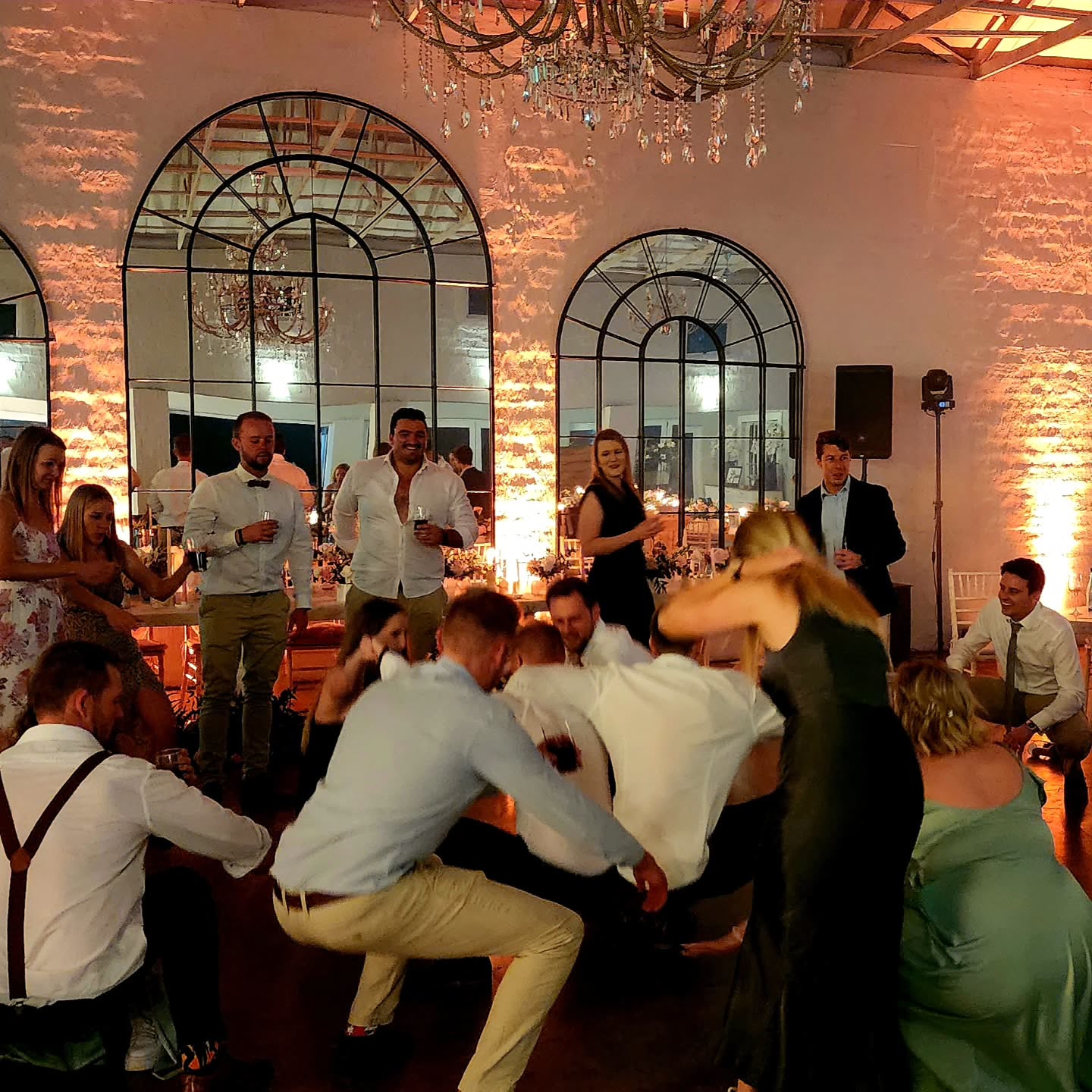 The Groves wedding reception dance floor with DJ lighting effects at Caversham Valley venue