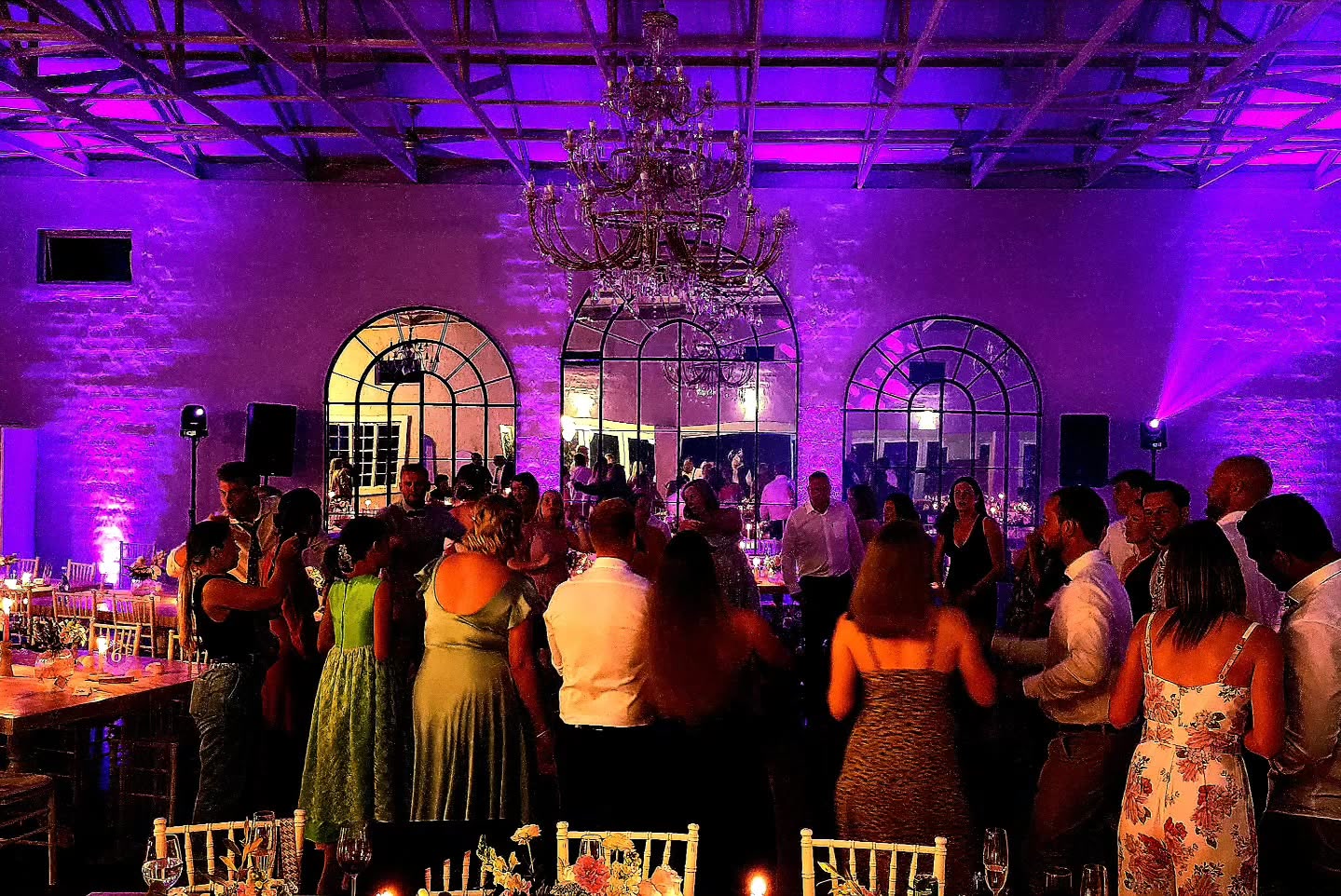 The Groves wedding dance floor atmosphere with DJ lighting at Nottingham Road reception