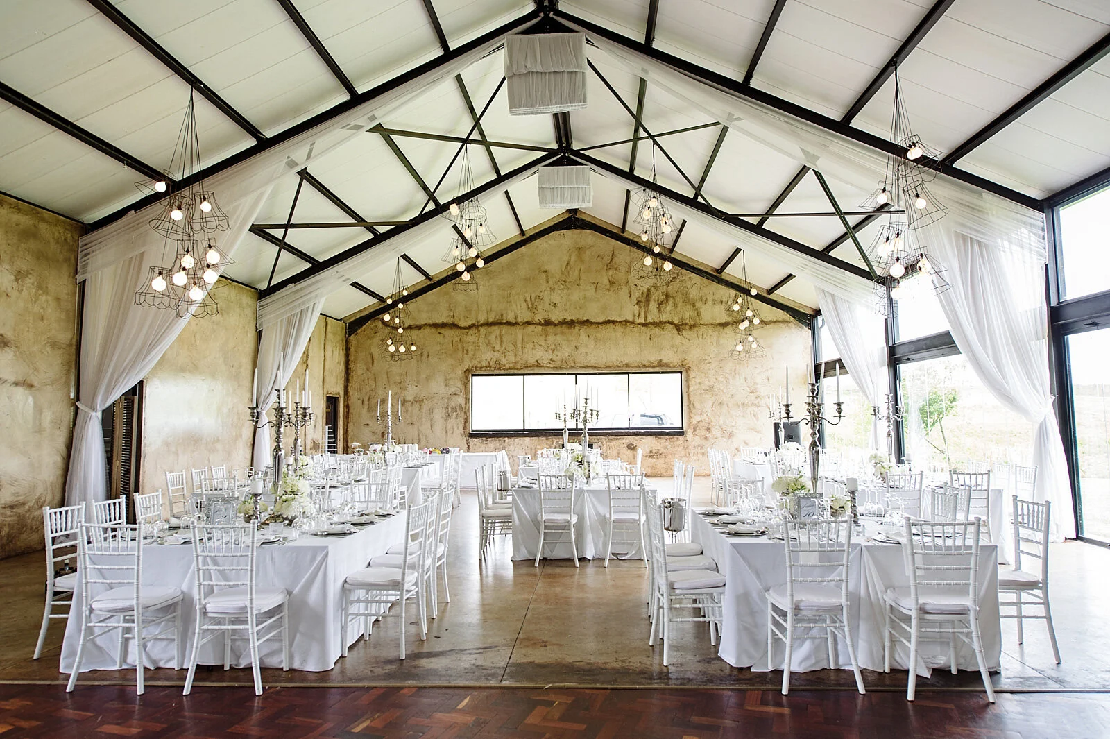 Netherwood Farm wedding reception setup with beautiful table settings and guest seating in KZN Midlands venue